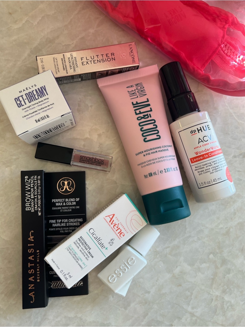Bundle of deluxe size hair and makeup samples